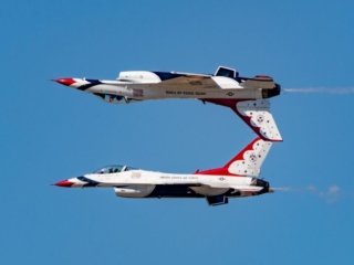 Two jets fly overhead in formation