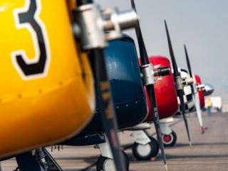 A line-up of parked airplanes