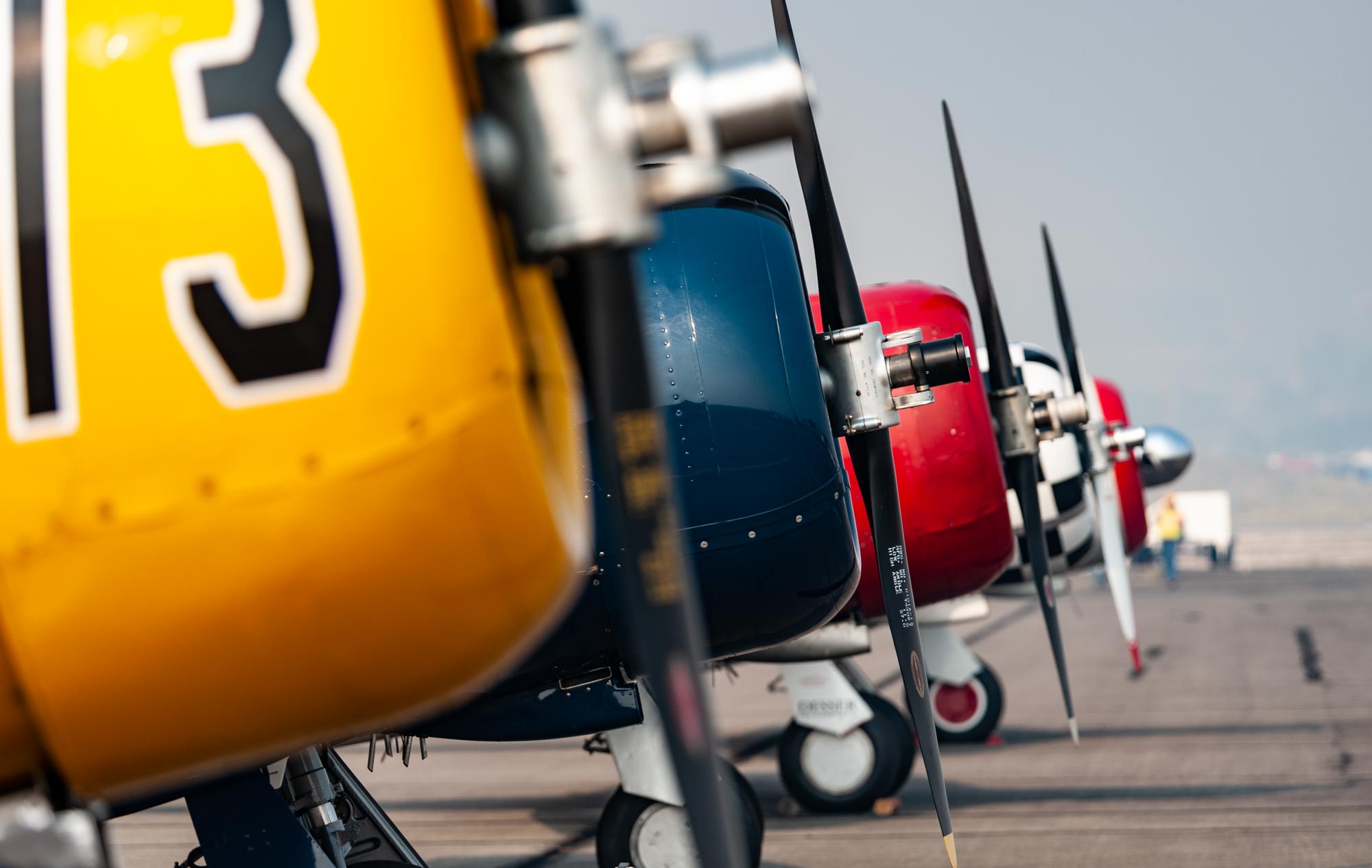A line-up of parked airplanes