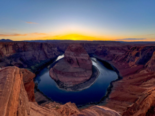 A dramatic sunset view of horseshoe bend